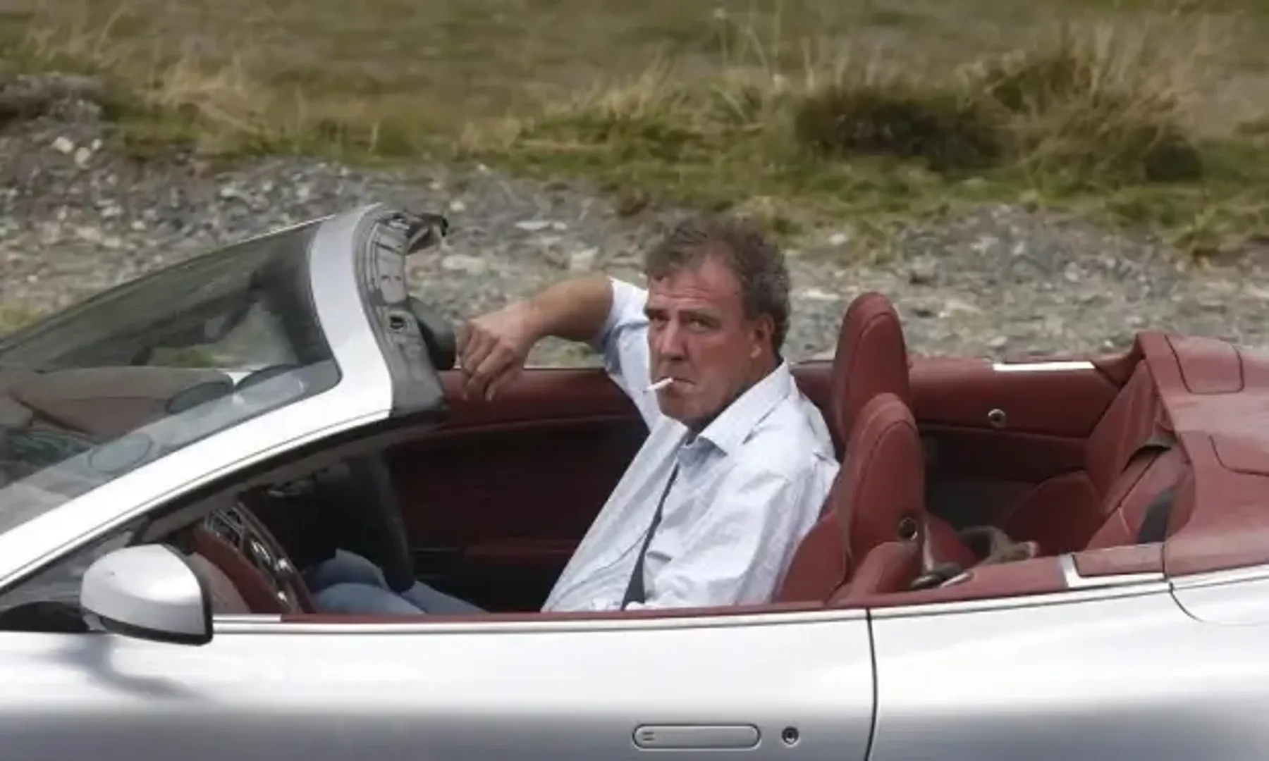 Jeremy Clarkson in a car smoking