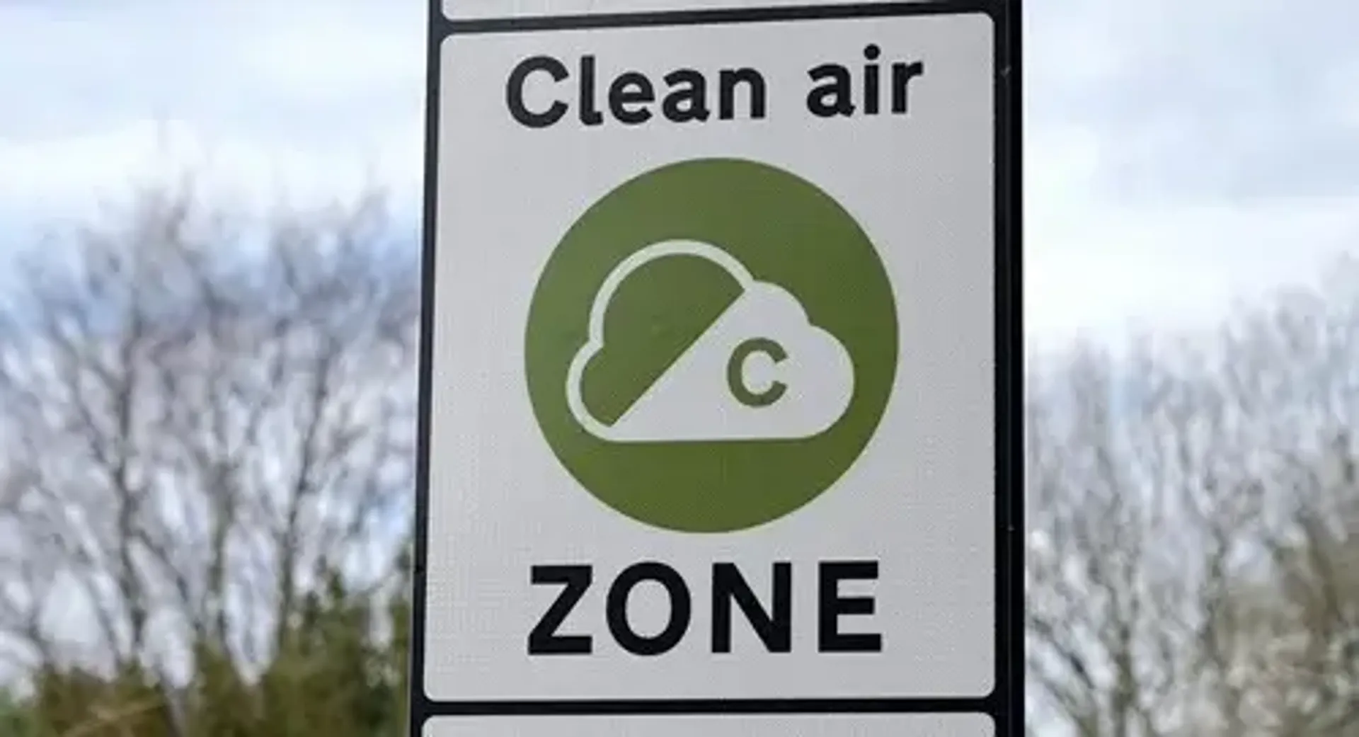 A sign displaying "Clean Air Zone" to indicate an area with improved air quality measures.
