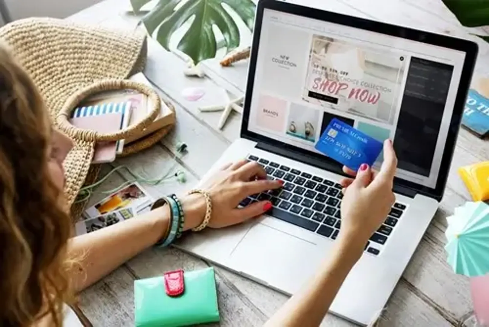 Woman on laptop entering card details