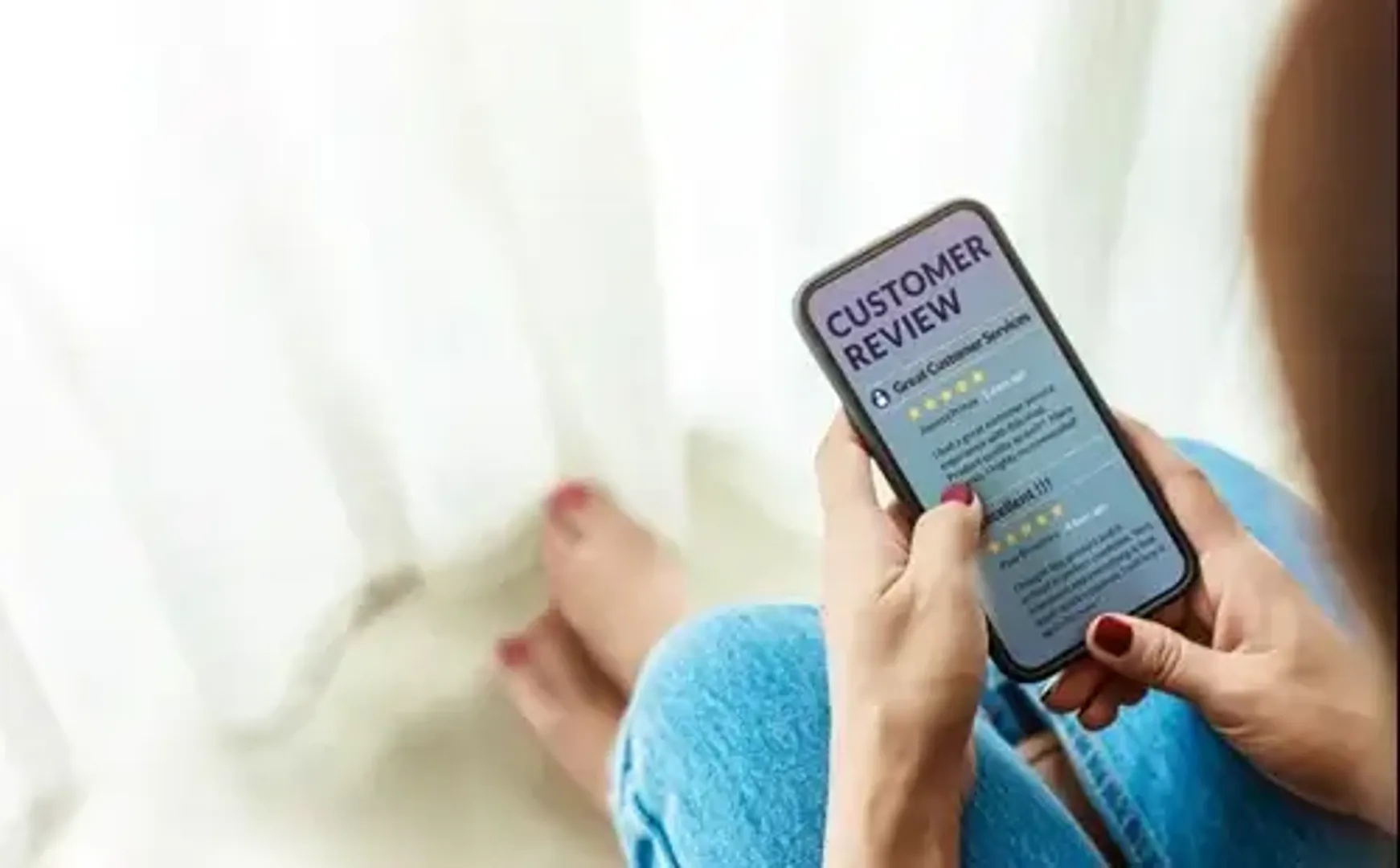 Person looking at customer reviews on phone