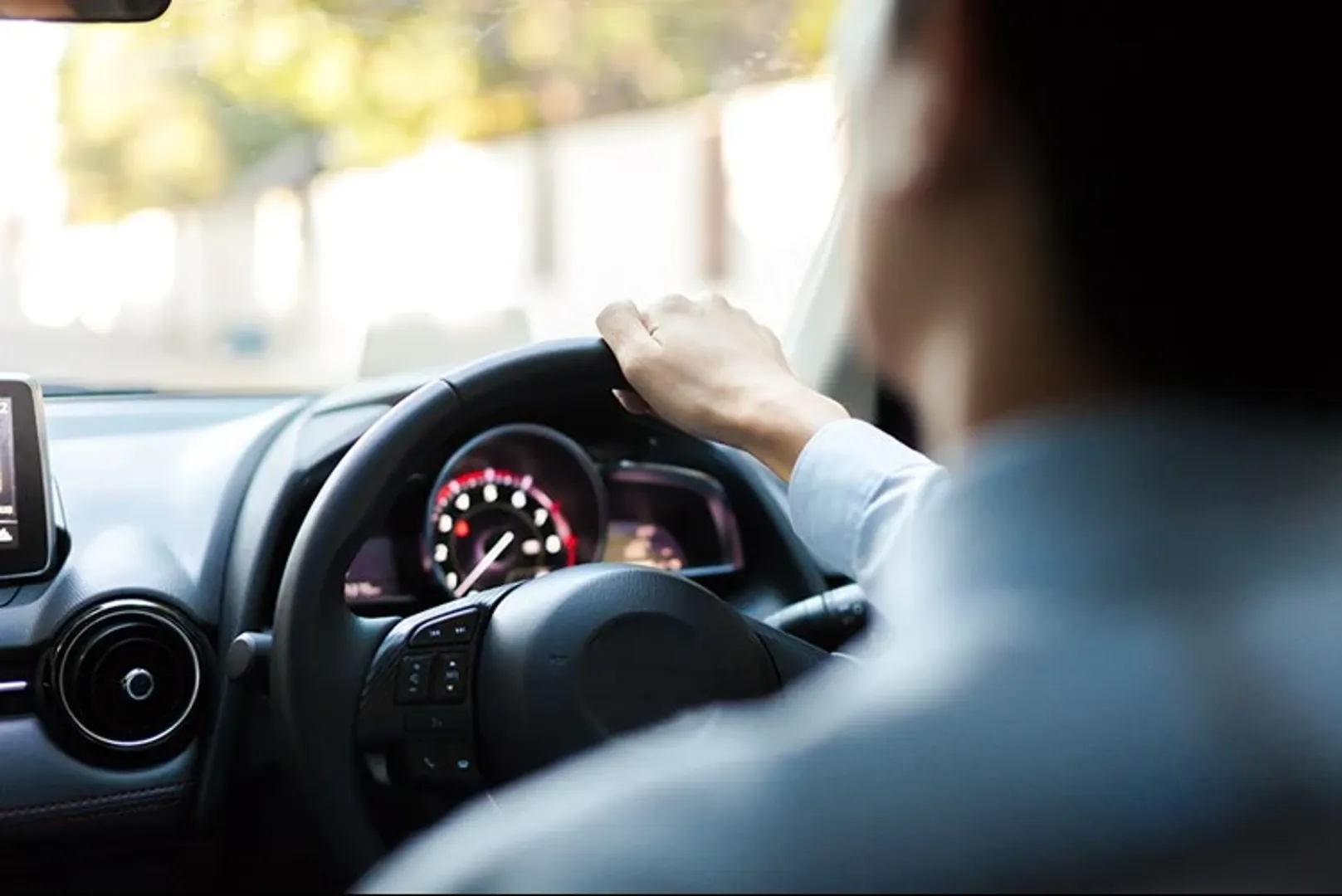 Man driving a car