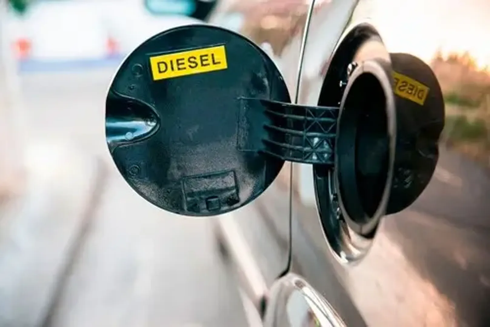 A close-up image of a diesel fuel cap.