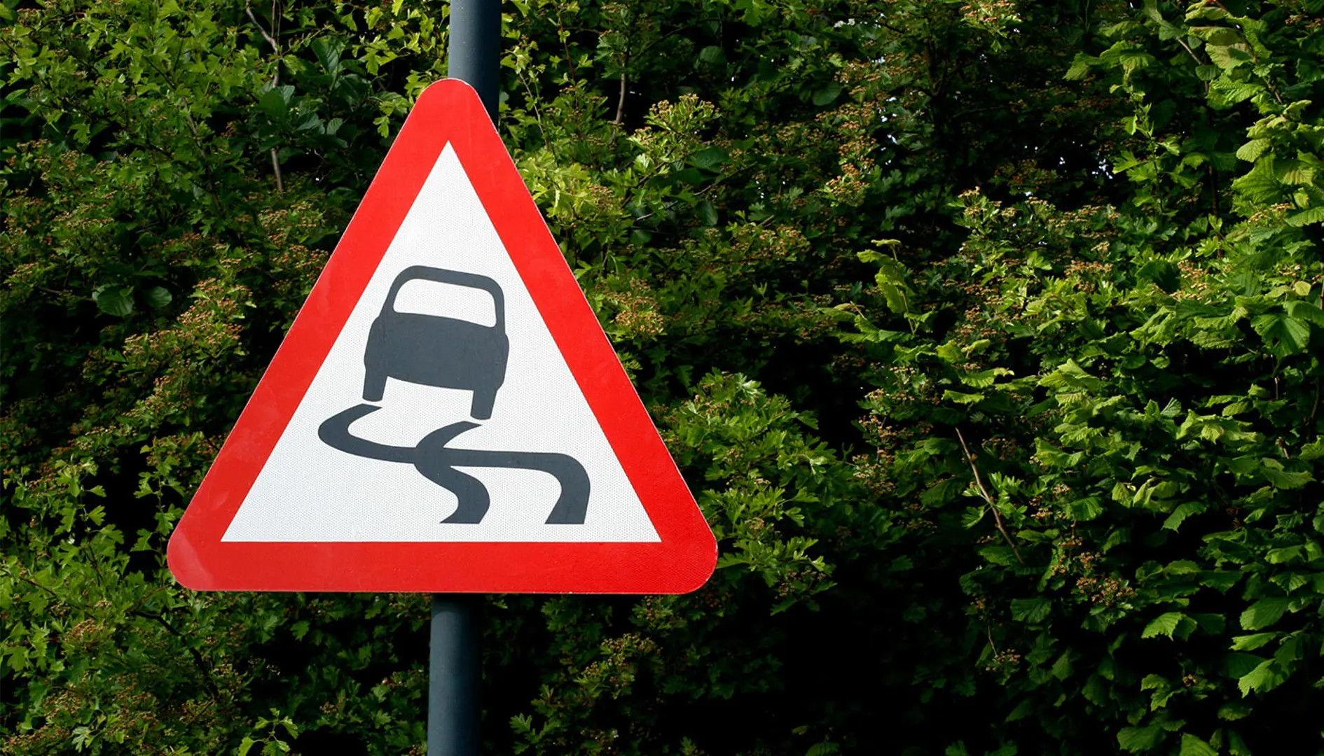 Road sign, warning slippery road